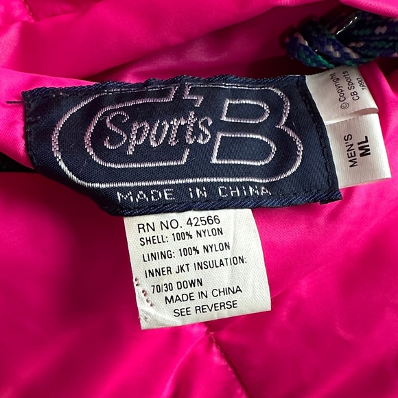 Bold Pink Puffer Jacket with Blue and Green Details - Picture 2 of 14